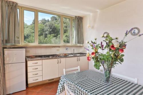 Η κουζίνα ή μικρή κουζίνα στο Villa Vanna Trilo -quadrilocale