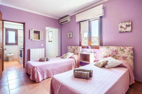 Llit o llits en una habitació de Villa Dos Estels