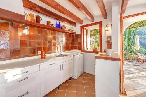 Kuchyň nebo kuchyňský kout v ubytování Can Sans