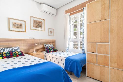 Ліжко або ліжка в номері Villa Con Encanto Cerca De La Playa