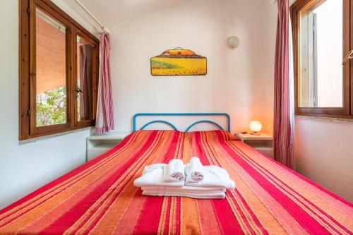 Tempat tidur dalam kamar di Accu is Prezzus Villetta E1 50mt