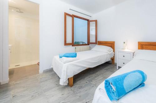Postel nebo postele na pokoji v ubytování Casa Coronel Aloy