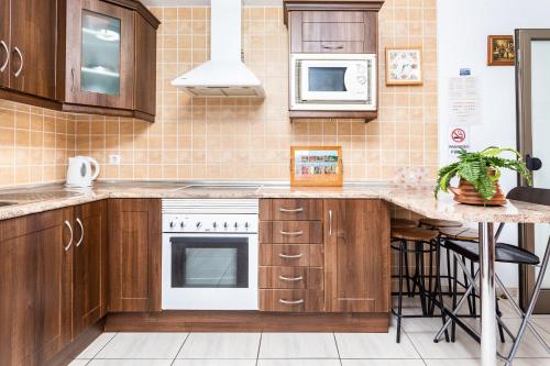 Kuchyň nebo kuchyňský kout v ubytování Apartamento el Carmen