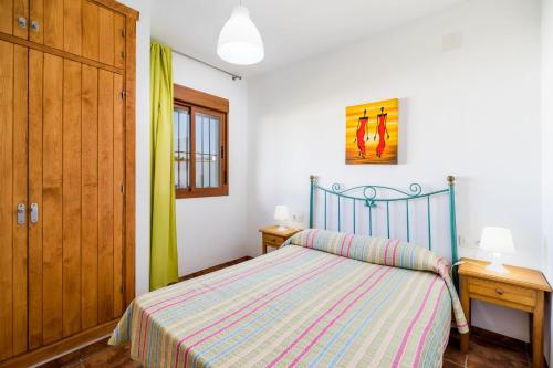 Ένα ή περισσότερα κρεβάτια σε δωμάτιο στο Villa Ca1