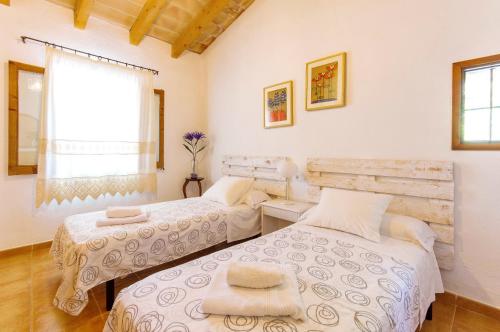 Postel nebo postele na pokoji v ubytování Na Garrovera