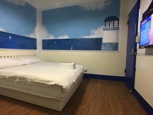 Una cama o camas en una habitación de Greece Mediterranean B&B