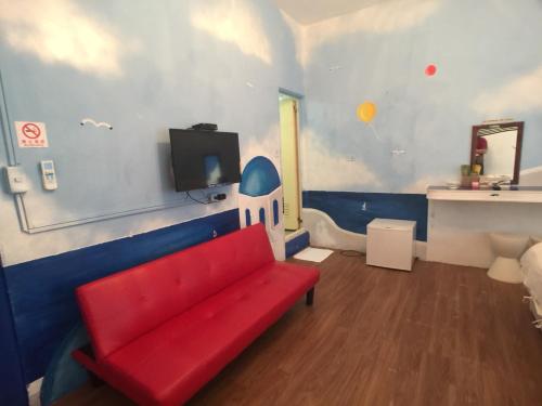 Una televisión o centro de entretenimiento en Greece Mediterranean B&B
