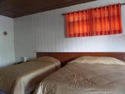 Postel nebo postele na pokoji v ubytování Bromo Permai 1