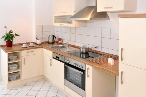 Köök või kööginurk majutusasutuses Pension Müllers Alte Backstube