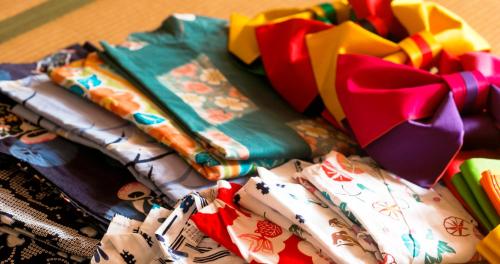 a pile of wrapped presents sitting on a table at Nara Hakushikaso in Nara