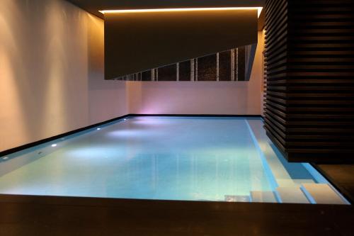 a swimming pool in a room with at Chalet Mathon in Ischgl