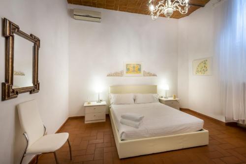 Postel nebo postele na pokoji v ubytování Pignone Apartment by Mmega