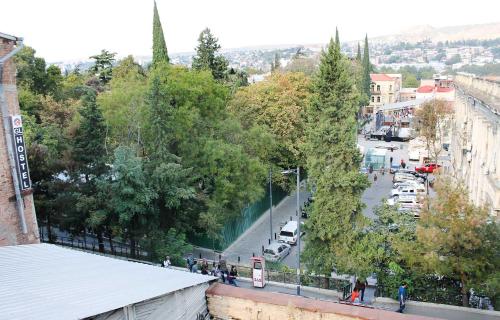 a view of a city with a street and trees at Twins in Tbilisi City