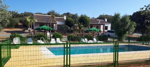 The swimming pool at or close to Las Casitas de los Cano