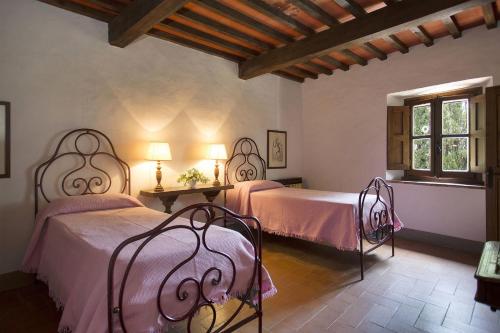 A bed or beds in a room at Malmantile by Salogi Villas