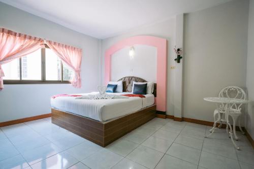 Postel nebo postele na pokoji v ubytování Jintana Resort