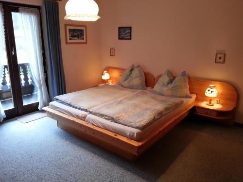 A bed or beds in a room at Haus Chorinskyklause