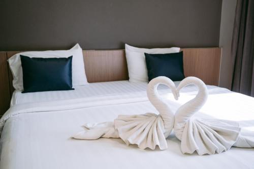 Postel nebo postele na pokoji v ubytování Jintana Resort