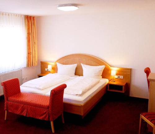 Katil atau katil-katil dalam bilik di Hotel Landgasthof Blume