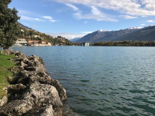 a large body of water with mountains in the background at Casa Marconi in Lovere