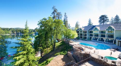 an aerial view of a large house with a swimming pool at Lake Arrowhead Resort & Spa in Lake Arrowhead