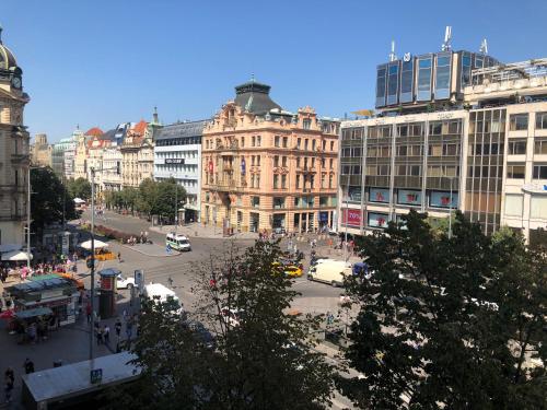a view of a city street with buildings at EA ApartHotel Melantrich in Prague