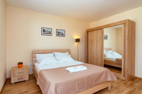 Кровать или кровати в номере Uphill Glavanovic Villas