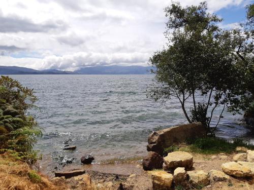a view of a large body of water at La Quinta Glamping - Lago de Tota in Cuítiva