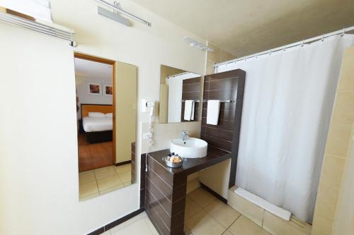 Koupelna v ubytování Centro 19 Hotel