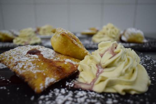 a close up of some food on a plate at Hotel River in Civitella Roveto