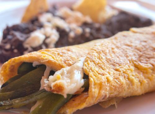 a close up of a sandwich on a plate at Hotel Camino Antiguo in Guanajuato