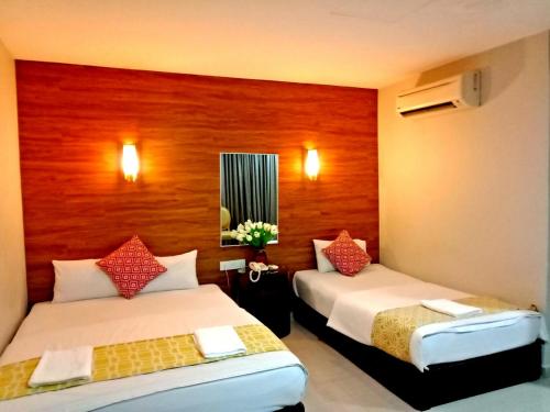Кровать или кровати в номере Eazy Hotel at Ampang
