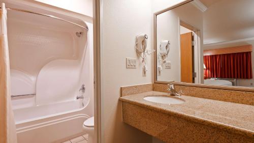 a bathroom with a sink and a mirror at Best Western Anthony/West El Paso in Anthony
