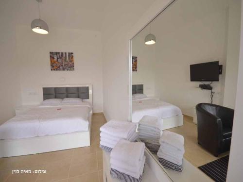 Ένα ή περισσότερα κρεβάτια σε δωμάτιο στο Zimmer Monte