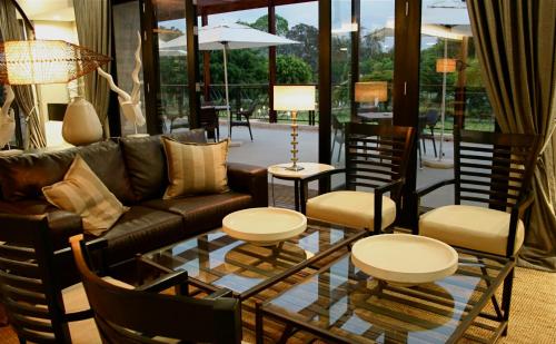 Χώρος καθιστικού στο Mount Meru Hotel