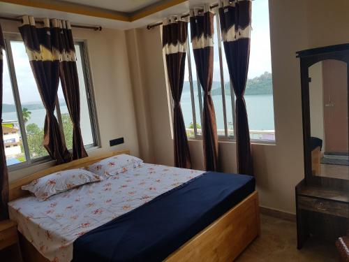 Postel nebo postele na pokoji v ubytování Abhi's homestay