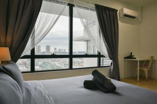 Katil atau katil-katil dalam bilik di USJ One HomeStay @ Subang HomeStay