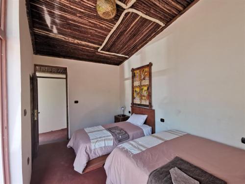 Ένα ή περισσότερα κρεβάτια σε δωμάτιο στο Lalibela Apartments