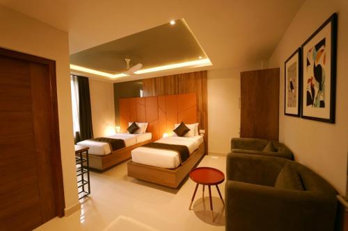 Tempat tidur dalam kamar di WithInn Hotel - Kannur Airport