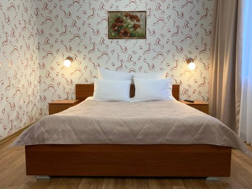 Кровать или кровати в номере Гостиница Тимптон