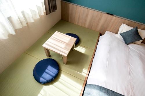 Hotel Lantana Naha Matsuyama 객실 침대