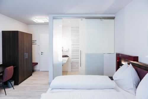 Cama o camas de una habitación en Winzerhof Dürauer
