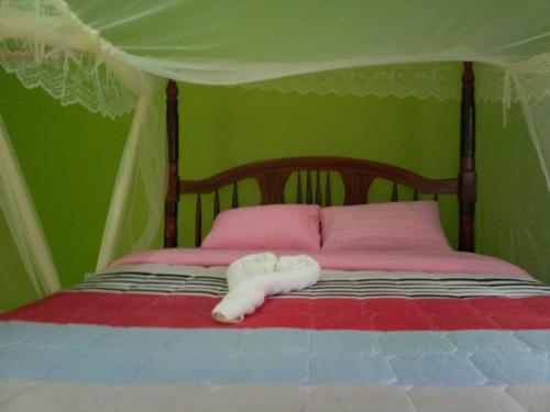 Postel nebo postele na pokoji v ubytování Sipi Traveller's Lodge