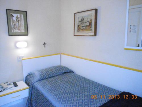 Albergo Villagrandeにあるベッド