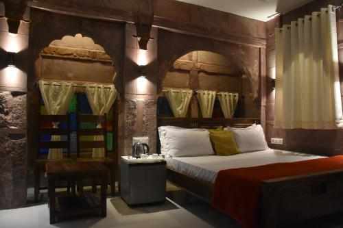 Voodi või voodid majutusasutuse The Kutumb Villa - A Heritage Home Stay toas