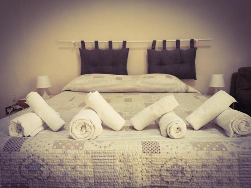 Ein Bett oder Betten in einem Zimmer der Unterkunft Casa vacanze Caterina