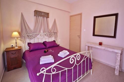 Postel nebo postele na pokoji v ubytování Sfakia Thea Apartments