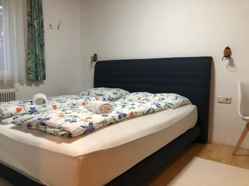 Ein Bett oder Betten in einem Zimmer der Unterkunft Appartements Haus Andrea