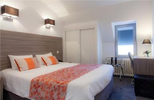 Katil atau katil-katil dalam bilik di Hôtel Atlantic