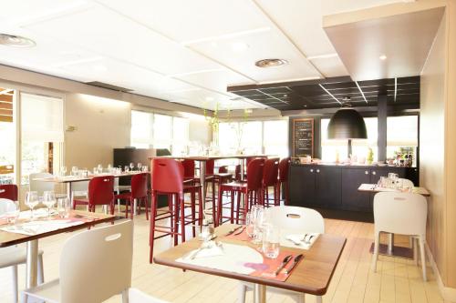Restaurant o un lloc per menjar a Kyriad Vitrolles Aéroport Marseille